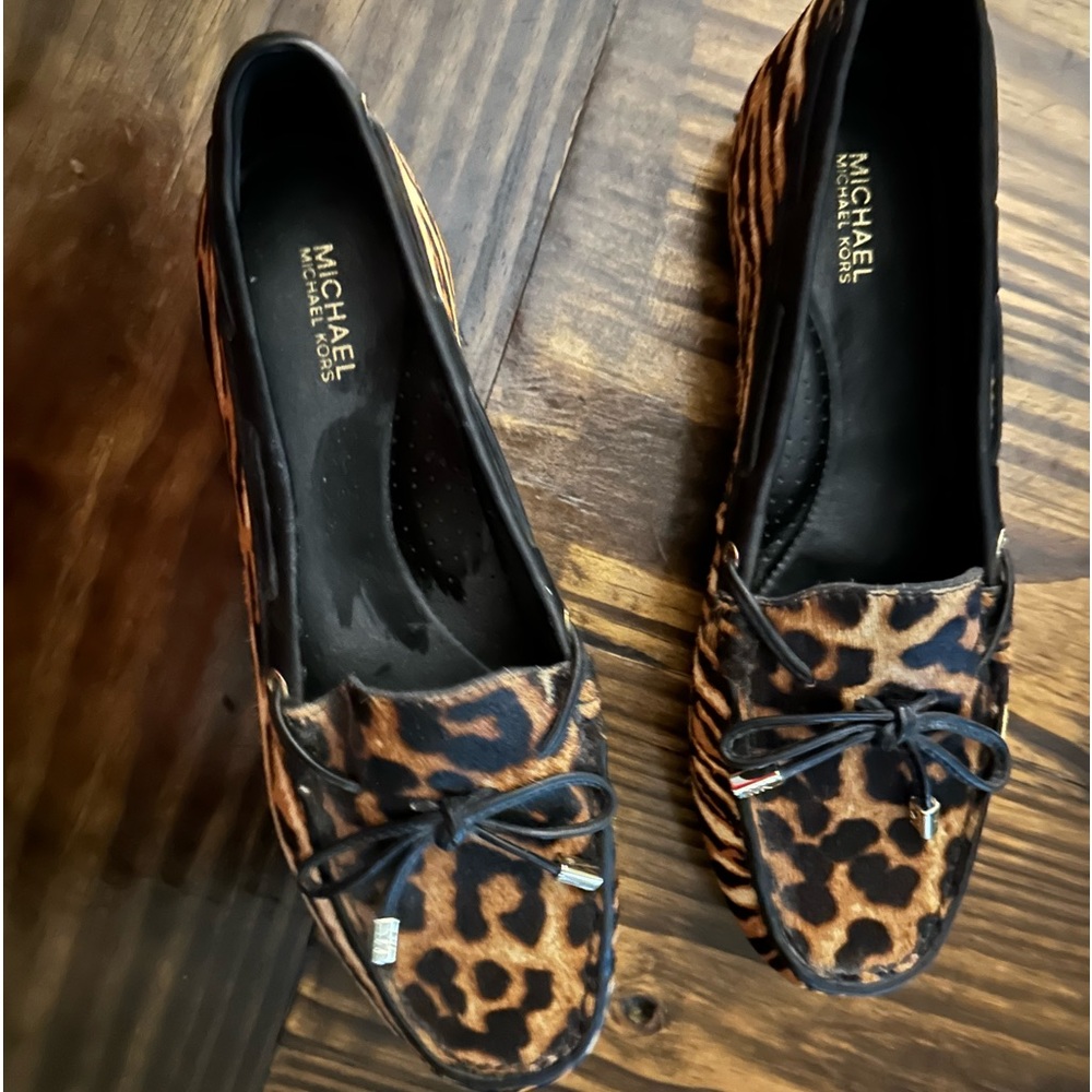 Michael Kors leopard hair calf upper rubber outsole.